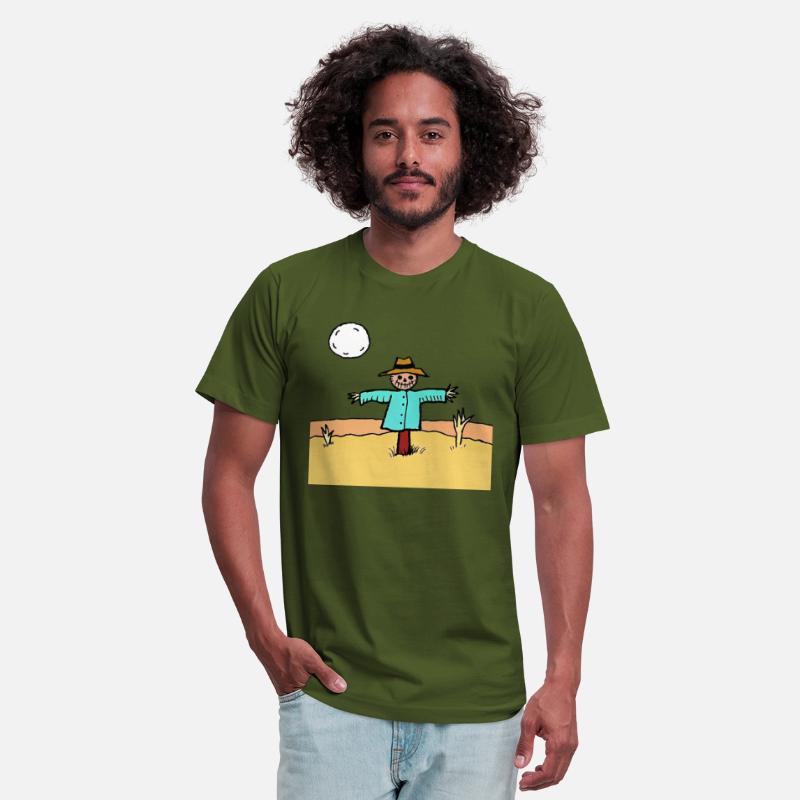 A scarecrow in a field on an illuminated night